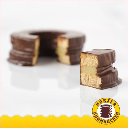 Baumkuchen Zartbitter mit Marzipanfüllung Baumkuchen Zartbitter mit Marzipanfüllung